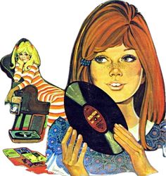 a woman holding up a record in front of her face