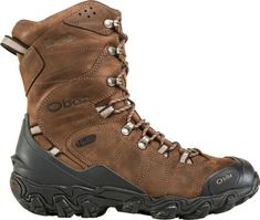 a pair of brown hiking boots on a white background