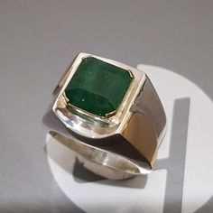 Watch video here: https://youtu.be/oy8TZ2IHB1o Natural Unheated Untreated beautiful Swat Rich green dark Emerald Rich Green Beautiful Color Stone weight : 7.30 Carats Stone shape is emerald cut Stone has natural inclusions but not broken Highest Quality Emerald Premium 925 Sterling Silver Ring size 10 US Resize able as per buyer choice Premium Quality Engagement Ring Anniversary Ring Shipping option is FedEx Three working days Handling Time Lowest Price ever for this kind of Big emerald. Contact Silver Octagon Emerald Ring, Modern Emerald-cut Green Diamond Ring, Green Octagon Diamond Ring, Formal Octagon Emerald Ring May Birthstone, Formal Octagon Emerald Ring For May Birthstone, Green Emerald Cut Gemstones For Anniversary, Modern Green Rings With Prong Setting, Emerald Cut Green Gemstones For Anniversary, Green Emerald Cut Sapphire Ring With Prong Setting