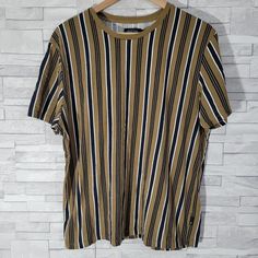 Mens BURTON Brown Striped T Shirt Top Jersey Round Neck Cotton Large. Very good used condition will need a wash. Pit to pit measurement is 23 in. Shoulder to hem is 26 in. Combined postage  For items with a postage price combined postage is fixed at £5.90 if 2 or more items are purchased. Please message for a revised invoice to be sent. Clothing  As items are kept in storage, it is advised to wash the garment before use. If there are any marks this will be mentioned in the listing description above. Striped Jersey, Striped T Shirt, Shirt Top, Mens Clothing Styles, T Shirt Top, Shirts Tops, Round Neck, Mens Outfits