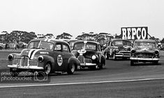 three old cars racing on a track with the word repco painted on it's side