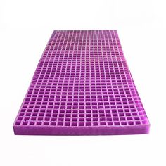 a purple mat with squares on it is shown in front of a white background,