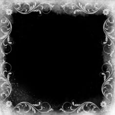 a black and white photo with an ornate frame