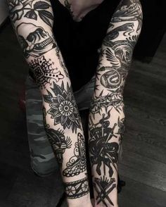 a person with tattoos on their arms and legs