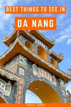 an orange and white tower with the words best things to see in da nang