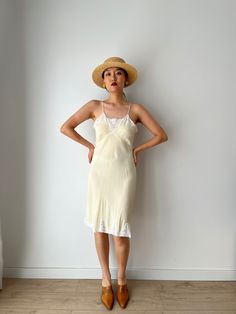 Vintage 1930s lace slip dress made of pure silk, perfect for summer  era: 1930 1940 material: 100% silk  Size: Best fits up to S, model wears S, 36 pit to pit:36cm waist:32cm Full length 98 cm condition: great antique condition Please keep in mind that this is almost 100 years old. It may have small marks and/or snags and sign of wear throughout. Please purchase willing to accept all signs of wear. NOTE For shop updates and extra info please follow me on Instagram: @shikivintage    *SHIPPING -We Fitted Beige Slip Dress With Lace Trim, Fitted Beige Lace Trim Slip Dress, Vintage Silk Dress With Spaghetti Straps, Fitted Slip Dress With Lace Trim For Beach, Sheer Vintage Slip Dress, Vintage Sleeveless Silk Slip Dress, Elegant Beach Slip Dress With Lace Trim, Spring Beach Slip Dress With Lace Trim, Vintage Summer Slip Dress With Delicate Lace