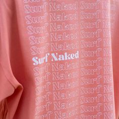 Details Surf Naked is an easygoing expression surfers use when they hit the waves without wearing a swimsuit or any gear. It's about enjoying the ocean breeze and soaking up the sun while catching some waves. It's like becoming one with the ocean, feeling the wind and water all around you. Crafted from 100% heavyweight cotton, it's both strong and comfy. We're a Sustainable Surf brand, so we chose materials that are earth-friendly. This tee has a relaxed, oversized fit that's just right for thos Surfer Vibe, Surfing Swimsuit, Types Of Shorts, Surf Swimsuit, Surf Brands, Surf Shirt, Surf Life, Surf Wear, Surf Style