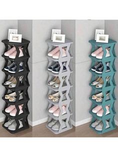 three pairs of shoes are hanging on the wall next to each other in this shoe rack