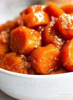 a white bowl filled with sweet and sour food