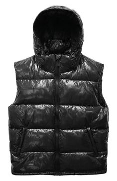 Layer on this shiny puffer vest constructed with a drawcord-toggle hood, handy zip pockets and warm recycled insulation for superior comfort on the go. 27" length Front zip closure Drawcord-toggle hood Front zip pockets; interior welt pocket Drawcord-toggle hem Lined, with 100% recycled polyester fill 100% polyester Machine wash, line dry Made in China Shiny Puffer Vest, Hooded Puffer Vest, Puffer Vest, Black Fits, Welt Pocket, Insulation, The Go, Zip Pockets, Puffer