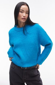 A classic crewneck sweater is irresistibly updated with a fuzzy texture for extra coziness and dropped shoulders for a slouchy fit. Crewneck Long sleeves 75% polyester, 18% nylon, 6% wool, 1% elastane Machine wash, line dry Imported Spring Floral Dress, Blue Sweater, Plain Design, Satin Slip Dress, Black Shirt Dress, Maxi Dress Trend, Swimwear Sale, Hoodies For Sale, Skorts