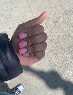 Right now, pink tip nails are super trendy. This usually means that you simply do a French manicure with pink tips, but there are a lot of ways to switch up this pink French tip Pretty Pink Nails French Tip, Short Pink Tips Nails, Pink French Tip Nails With Design Square, Square Pink Tips, Neon Pink French Tip Nails Square, Short Square French Tip Acrylic Nails Pink, Cute Nails Acrylic Short French Tip, Summer French Tips Short, Short Acrylic Nail Designs For Summer French Tips