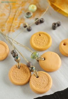 some yellow and brown buttons sitting on top of a table