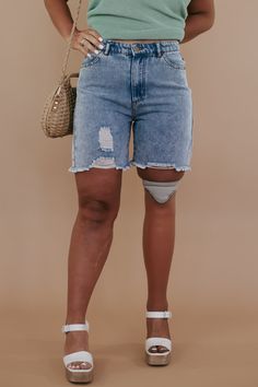 REAL shorts, for REAL bodies. Give your closet a stylish boost with a practical charm. Our Distressed Denim Shorts create an easygoing look that goes with any top, perfect for dressing up or going casual! Your go-to denim short as we take on summer! Distressed denim shorts Jean shorts Spring denim shorts Frayed bottoms Functional pockets Minimal distressing Button + Zip closure High Waisted 65% cotton, 35% polyester Imported Model Specs: Karli + Emily are wearing a size small in the photo.How wi Trendy Light Wash Denim Bermuda Shorts, Light Wash Bermuda Shorts With Frayed Hem, Trendy Light Wash Knee-length Jean Shorts, Medium Wash Knee-length Jean Shorts For Spring, Trendy Light Wash Knee-length Jeans Shorts, Distressed Denim Cutoff Bermuda Shorts, Casual Light Wash Bermuda Shorts With Frayed Hem, Denim Bermuda Shorts With Frayed Hem, Denim Cutoff Bermuda Shorts