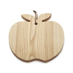 an apple shaped cutting board with a wooden handle