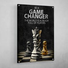 a black and white chess board with the words be a game changer on it