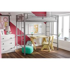 a loft bed with desk and chairs in a child's playroom or bedroom