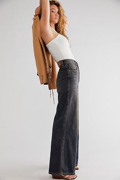 *The* perfect pair of jeans from The CRVY Collection, featured in a high-rise, wide-leg silhouette and curve-hugging waist design for the perfect fit with every wear. * High-rise silhouette * Zip fly and button closure * Five-pocket design * Rigid denim fabrication | CRVY Gia Wide-Leg Jeans by We The Free at Free People in Dark Wash, Size: 34 Womens Wide Leg Jeans, Jeans Free People, High Rise Wide Leg Jeans, All Jeans, Concert Fits, Embellished Jeans, Blue Fits, Baggy Jeans, Boho Clothing