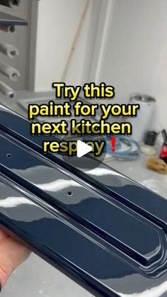 someone is holding up their new kitchen sink in front of the camera and text that reads try this paint for your next kitchen