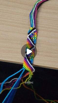 an image of a colorful string on a table