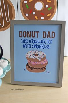 there is a sign that says donut dad like a regular dad with sprinkles