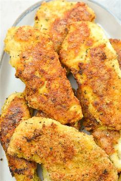 some fried food is on a plate and ready to be eaten