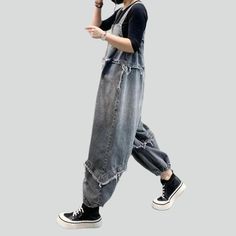 Introducing our 2023 Spring-Summer Collection ââ‚?a distressed aged pieced-together denim jumpsuit for the fashion-forward!Why It's Your Next Wardrobe EssentialThis denim jumpsuit is your ticket to an effortless cool look. with its vintage-inspired patched and edgy ripped pattern. It's patterned for comfort and style. with a baggy look. suspenders closure. and snug slim silhouette. Crafted with premium quality denim. this jumpsuit promises durability and high-end fashion.Key Highlights: Vintage Casual Denim Overalls With Patchwork, Casual Denim Patchwork Overalls Jumpsuit, Casual Baggy Patchwork Overalls, Denim Blue Jumpsuit With Frayed Hem, Summer Denim Patchwork Jumpsuit, Spring Ripped Overall Jumpsuits And Rompers, Denim Patchwork Jumpsuit Overalls, Distressed Cotton Jumpsuits And Rompers In Medium Wash, Baggy Patchwork Overalls