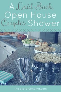 an open house couple's shower with food on the counter and in bowls next to it