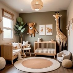 a baby's room with giraffes and other toys