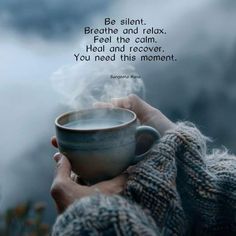 a person holding a coffee cup in their hands with the words, be silent breathe and relax