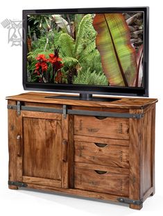 a wooden cabinet with drawers and a flat screen tv mounted on it's side