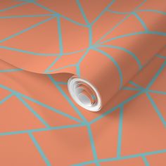 an orange and blue wallpaper with geometric shapes