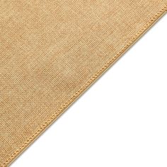 a close up view of an area rug that has been made from natural materials and is beige