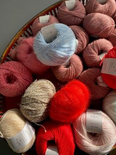 several skeins of yarn in a basket