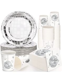 a set of party supplies including cups, plates and napkins with disco balls on them