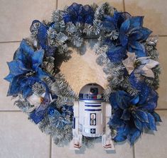 a star wars wreath with a r2d2 figure