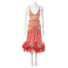 ▪ Prada evening bra and skirt ensemble ▪ Designed by Miuccia Prada ▪ Fall-Winter 2017 ▪ Constructed from salmon silk ▪ Beaded fringe trim ▪ Pink ostrich and turkey feather embellishments ▪ Marked size '38', Bust: 32.5 - 34", Waist: 26", Hips: 36" ▪ Made in Italy All photographs in this listing EXCLUDING any reference or runway imagery needs the credit of the copyright owner if you want to perform certain acts, such as copying the images or sharing them on the internet. Using the images to sell t Beaded Skirt, Miuccia Prada, Silk Taffeta, Fringe Trim, Beaded Fringe, John Galliano, Pink Silk, Vivienne Westwood, Christian Dior