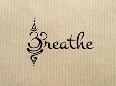 the word breathe written in cursive writing on a piece of brown paper with black ink