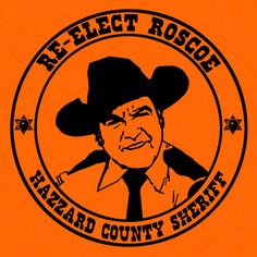 an orange background with a black and white image of a man wearing a cowboy hat