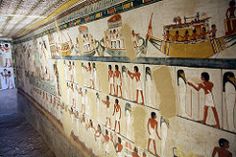 egyptian paintings on the wall in an ancient building