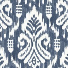 an abstract blue and white pattern on fabric