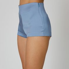 Introducing our Skye Silk Shorts, blending luxurious comfort with versatility. Expertly crafted from blue double silk satin, they feature a mid-waist and a sleek design, completed by a concealed side zip closure. Pair them with a breezy cover-up for a chic seaside look or dress them up under sheer dresses, for an elevated yet relaxed ensemble.  Match: Wear them under our Skye Silk Shirt Dress. Each Il Volo item is handmade by skilful artisans in our Bucharest atelier and it is created in limited series. 100% Italian Double Silk Satin.  Gentle dry clean. Do not wash. Do not use chlorine based bleach. Do not tumble dry. Cool iron, max 110 C.  Made in EU. Blue Skye, Sheer Dresses, Silk Shirt Dress, Satin Shorts, August Birthstone Jewelry, July Birthstone Jewelry, Silk Shorts, Zodiac Jewelry, Pearl Jewellery Earrings