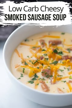 low carb cheesy smoked sausage soup in a white bowl