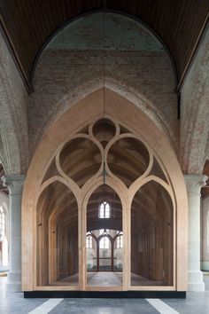 an arched doorway in the middle of a building