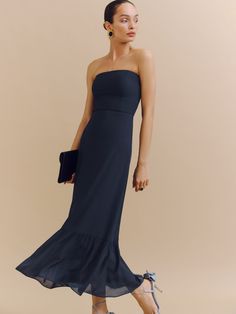 Romance alert. Shop the Arta Dress from Reformation, a strapless maxi dress that is fitted in the bodice and has a relaxed fitting trumpet skirt. Time Clothes, The Reformation, Flowing Fabric, Trumpet Skirt, Strapless Maxi, Swimwear Dress, Maxi Dress Navy, Strapless Maxi Dress, Linen Clothes