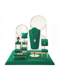 Metal Jewelry Display/Green Jewelry Display Set About this item: Microfiber surface that is soft to the touch and will protect your jewelry from any kind of damage or abrasion. Sturdy base allows for secure holding. It helps you see products clearly in contrast against bright colored jewelry. Highlights and organizes your most treasured jewelry accessories. Makes a practical and essential business item for retail stores and jewelry retailers. Attractive and sleek appearance suited for jewelry sh Jewelry Shop Window, Luxury Jewelry Display, Jewelry Shop Display, Jewelry Store Interior, Stand Jewelry, Jewelry Tray Display, Display Jewelry, Organizer Jewelry, Display Props