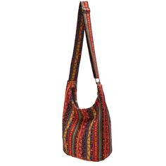 Discover Your New Favorite Accessory Step into the world of timeless style with our Bohemian Vintage Canvas Shoulder Bag. Perfectly blending practicality with artistic flair, this bag is designed for the modern woman who appreciates both form and function. The eye-catching geometric pattern and vintage style fuse to create a statement piece that elevates any outfit. Design and Craftsmanship Made from high-quality canvas with polyester lining, this shoulder bag ensures durability while maintaining a soft and comfortable feel. The spacious interior, featuring a dedicated cell phone pocket, provides ample room for all your essentials. Measuring 34 cm in width and height with a 10 cm thickness, and an adjustable strap that extends up to 125 cm, it offers both style and versatility. Key Feature Multicolor Large Capacity Hobo Satchel Bag, Multicolor Bucket Bag With Adjustable Strap, Multicolor Rectangular Hobo Bag With Large Capacity, Multicolor Tote Shoulder Bag With Adjustable Strap, Multicolor Hobo Shoulder Bag For Travel, Multicolor Bucket Shoulder Bag For Travel, Multicolor Large-capacity Rectangular Hobo Bag, Multicolor Shoulder Bucket Bag With Adjustable Strap, Multicolor Large Capacity Rectangular Hobo Bag