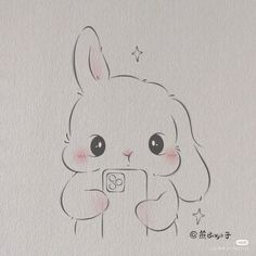 a drawing of a rabbit holding a camera