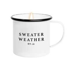 a white and black coffee mug with the words sweater weather no 16 printed on it