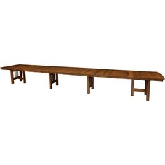 a long wooden table with two benches on it's sides and one bench at the end